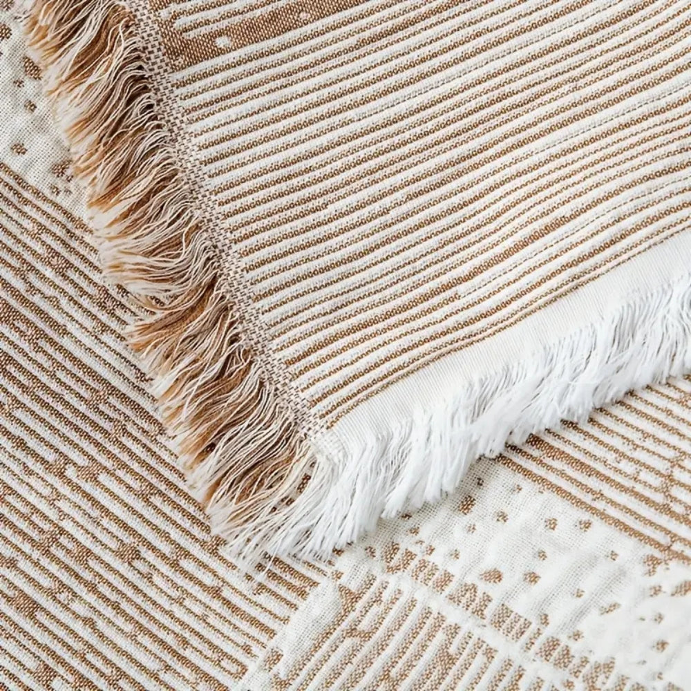 Plaid en coton géométrique tons mêlés