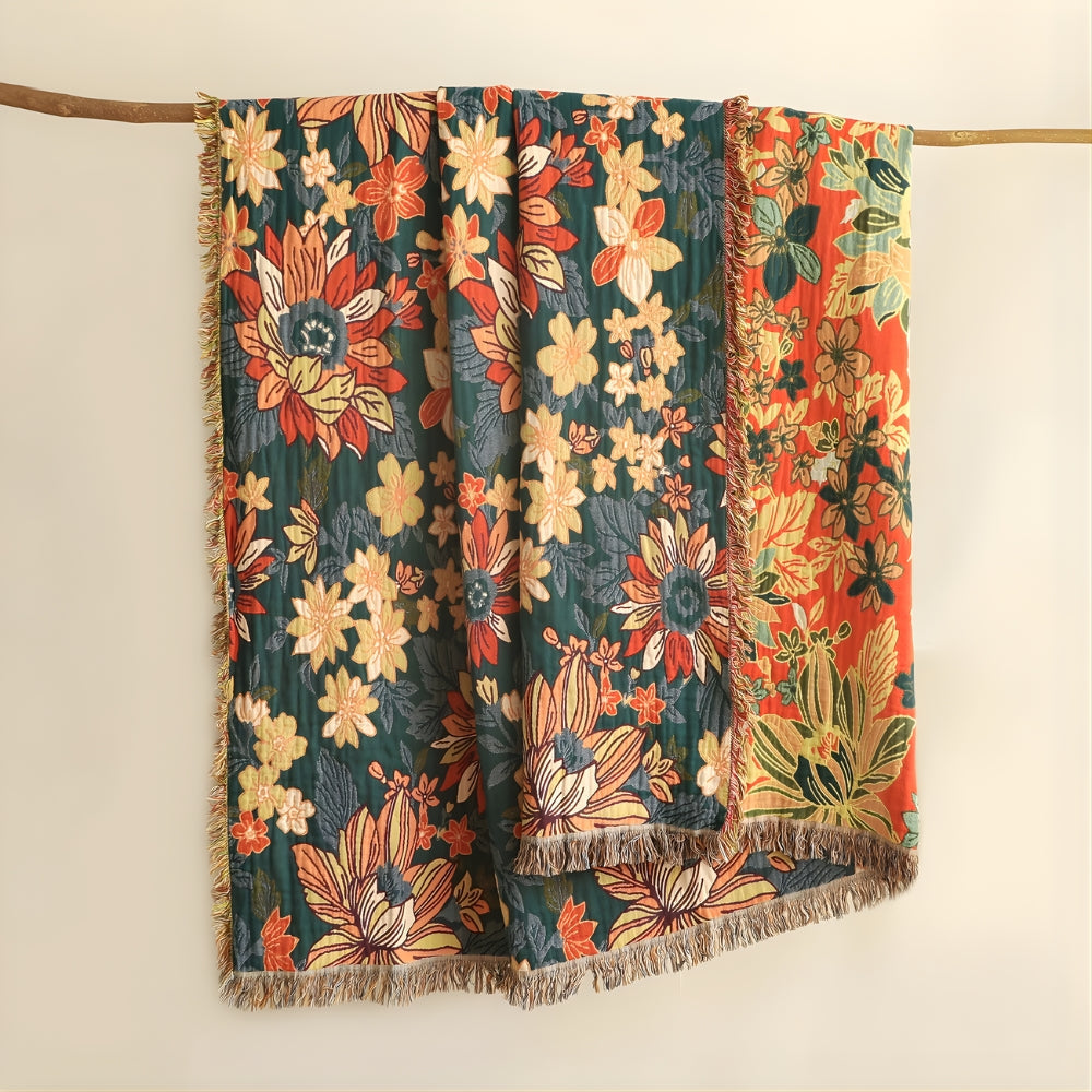 Plaid en coton fleuri à pompons