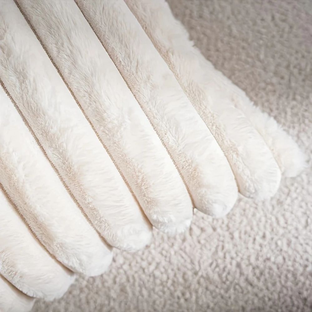 Housse de coussin en fausse fourrure Nouvia