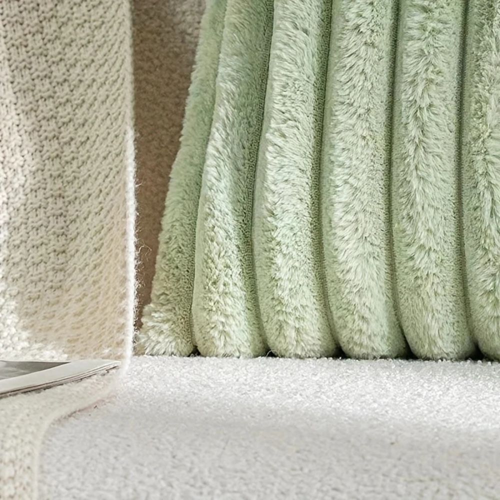 Housse de coussin en fausse fourrure Nouvia