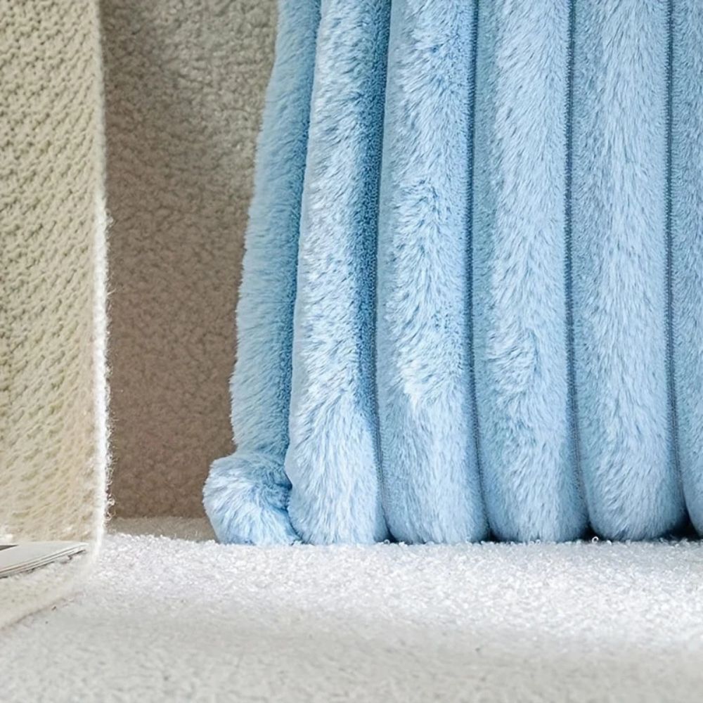 Housse de coussin en fausse fourrure Nouvia