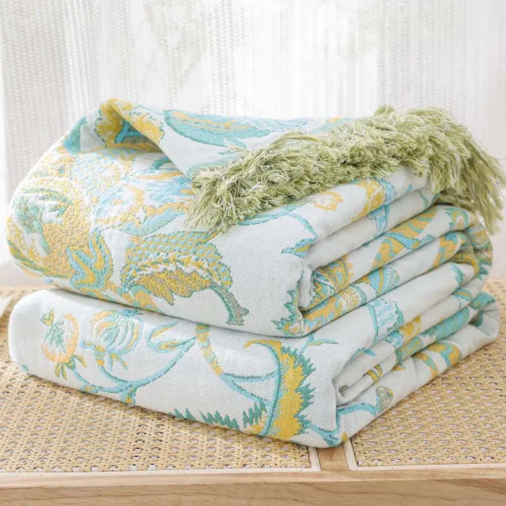 Plaid en coton fleuri à pompons Reverie