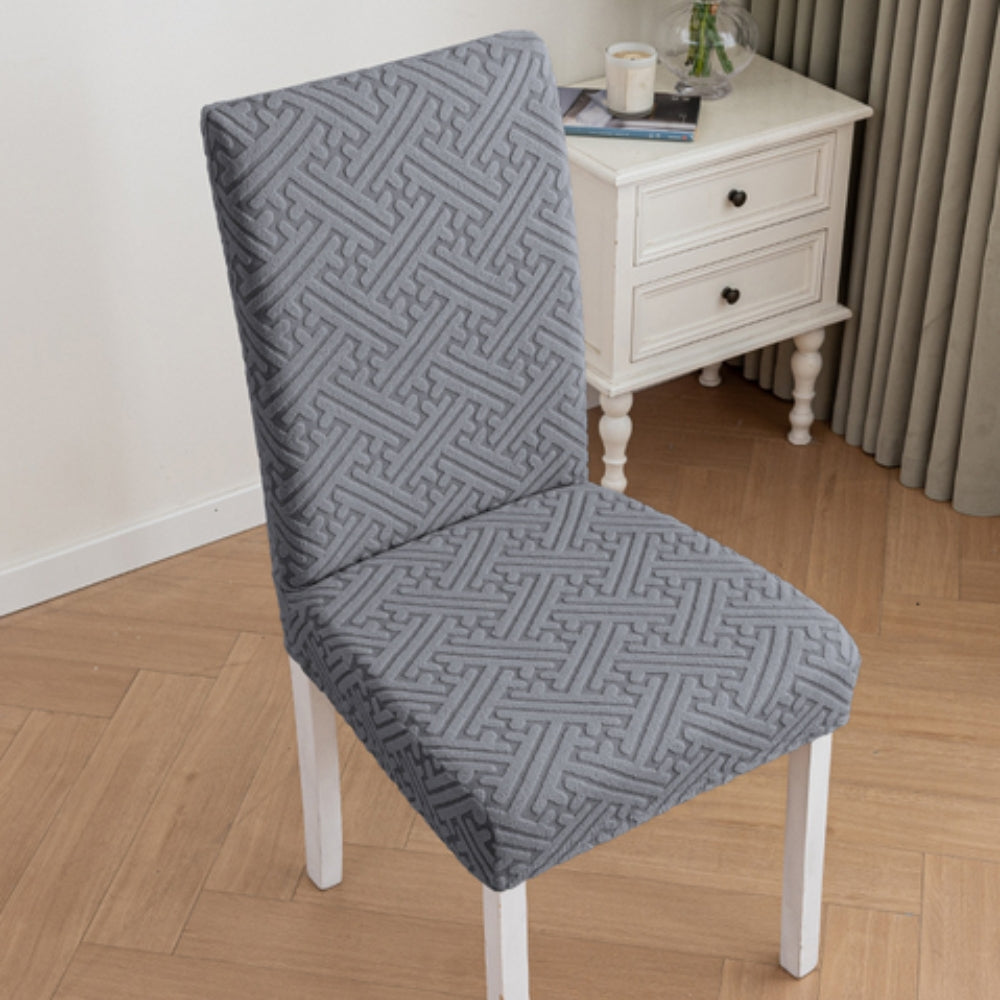 Housse de chaise extensible Silvra à losanges