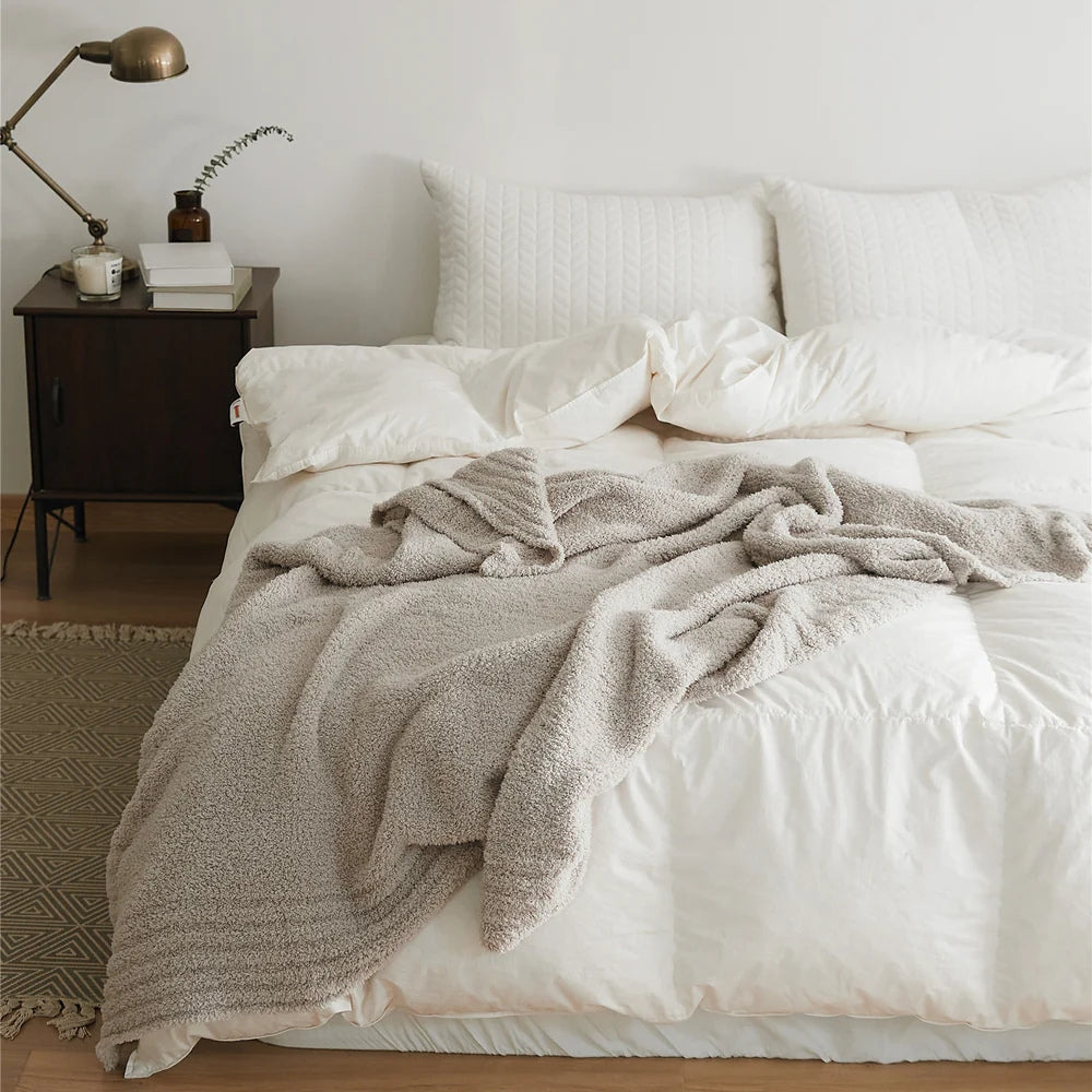 Plaid tricoté minimaliste Soft Nest