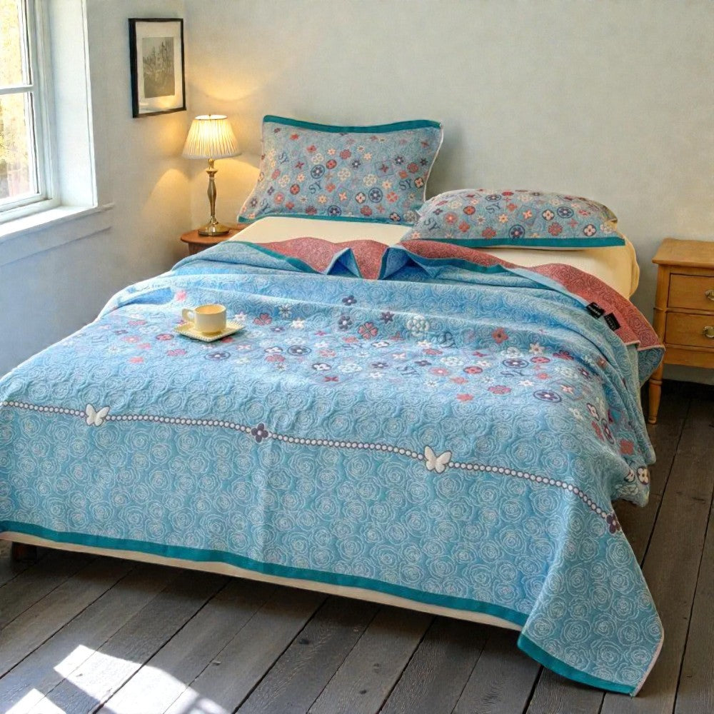 Plaid en gaze de coton fleuri turquoise
