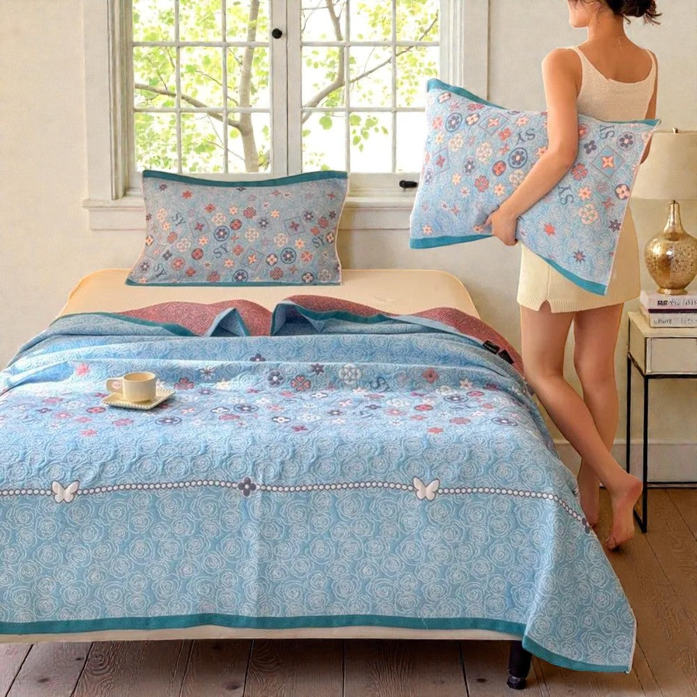 Plaid en gaze de coton fleuri turquoise
