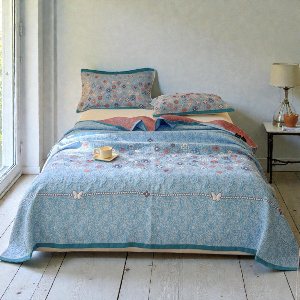 Plaid en gaze de coton fleuri turquoise