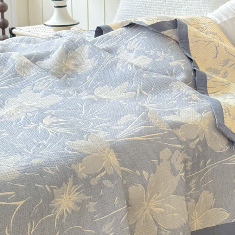 Plaid réversible en coton fleuri Velurelle