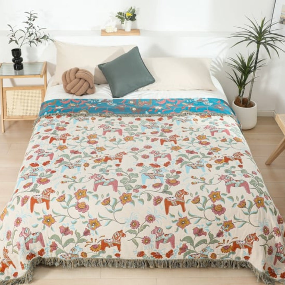 Plaid en coton à pompons jardin fleuri