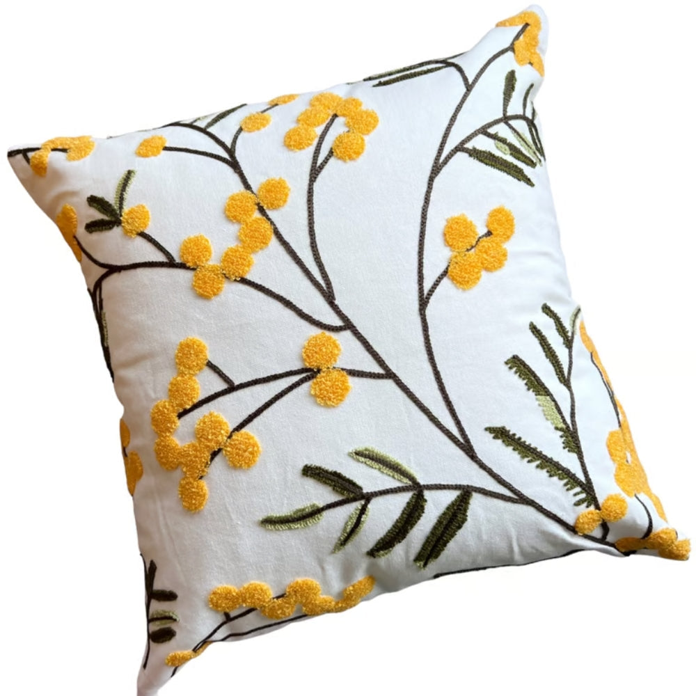 Housse de coussin brodée fleurs jaunes et feuilles