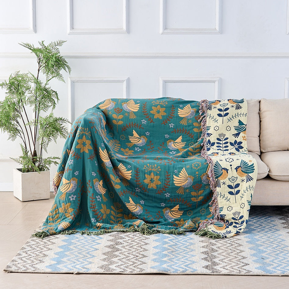 Plaid réversible aux oiseaux scandinaves | 100 % coton – 60"x80"