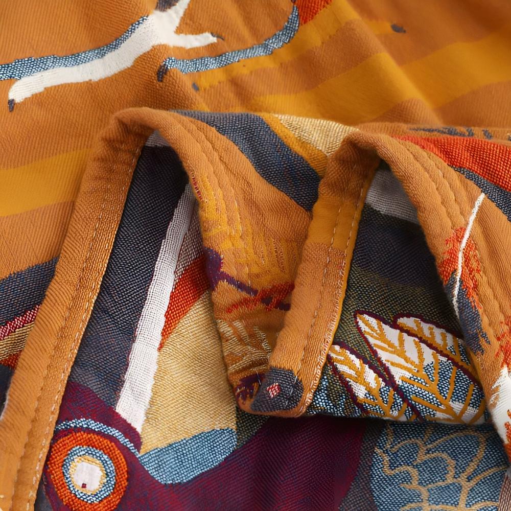 Plaid en coton motif toucan