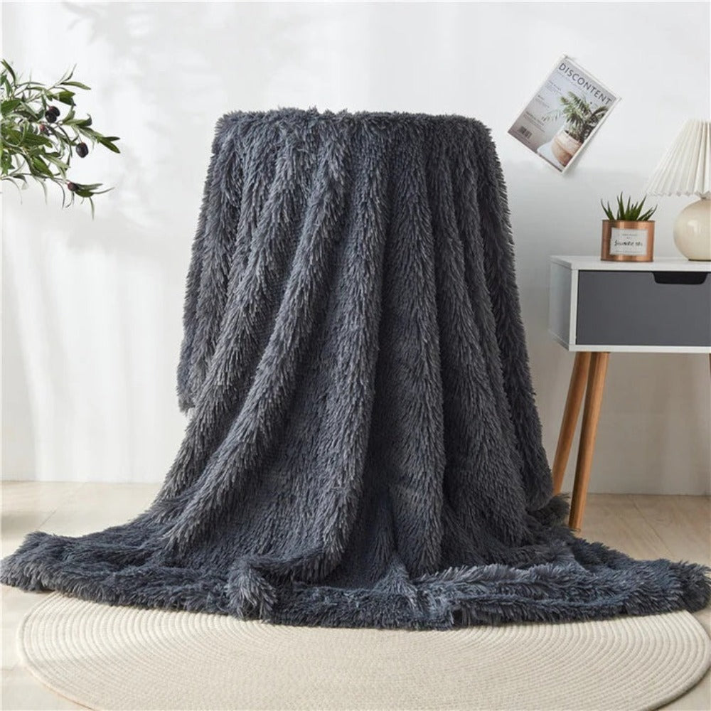 Plaid en fausse fourrure duveteuse