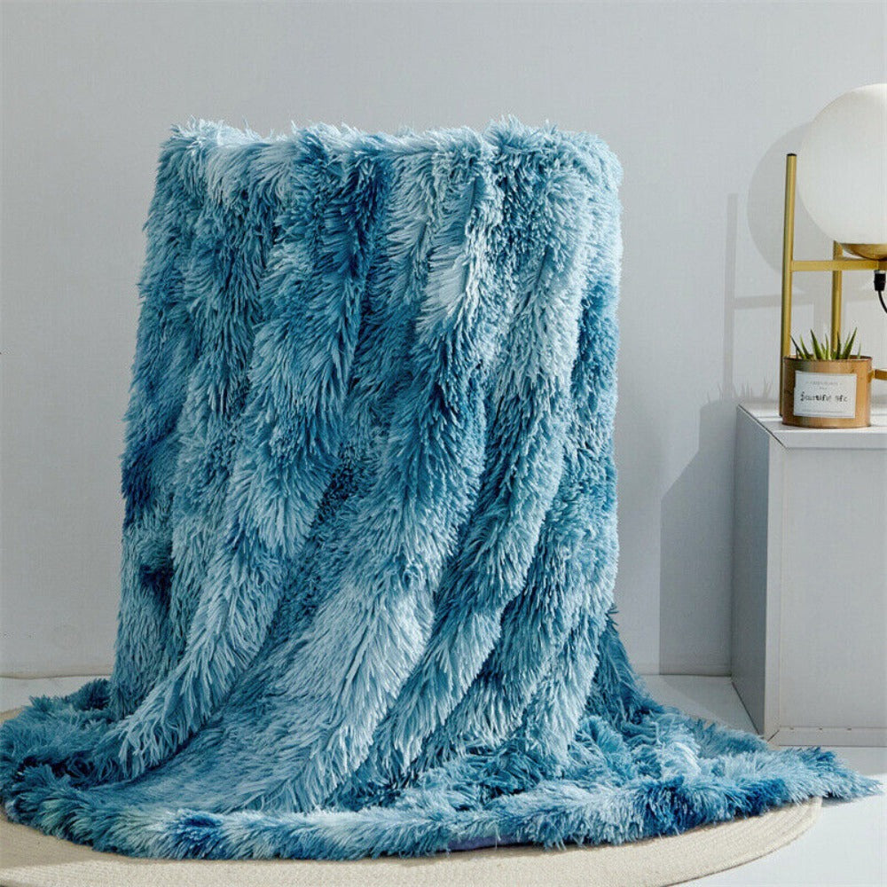 Plaid en fausse fourrure duveteuse