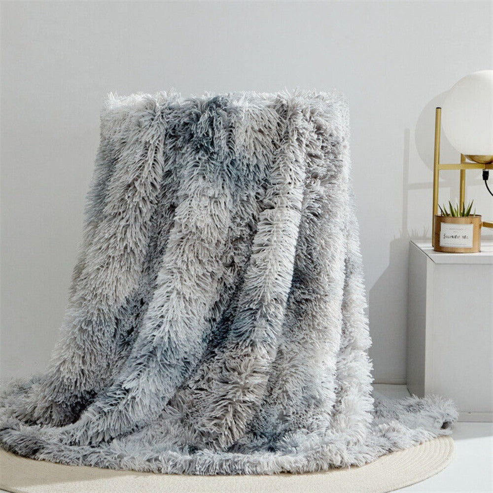 Plaid en fausse fourrure duveteuse